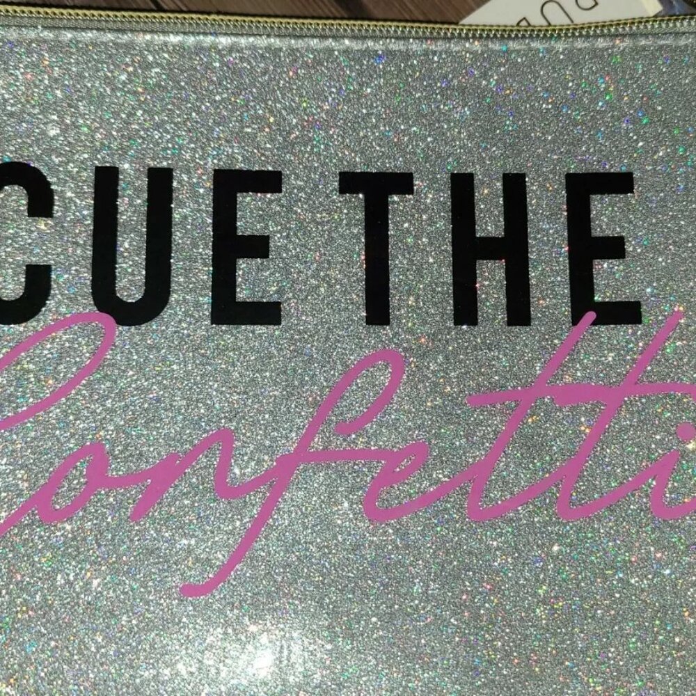 Ruby + Cash Cue The Confetti Pouch silver makeup case pouch. G1